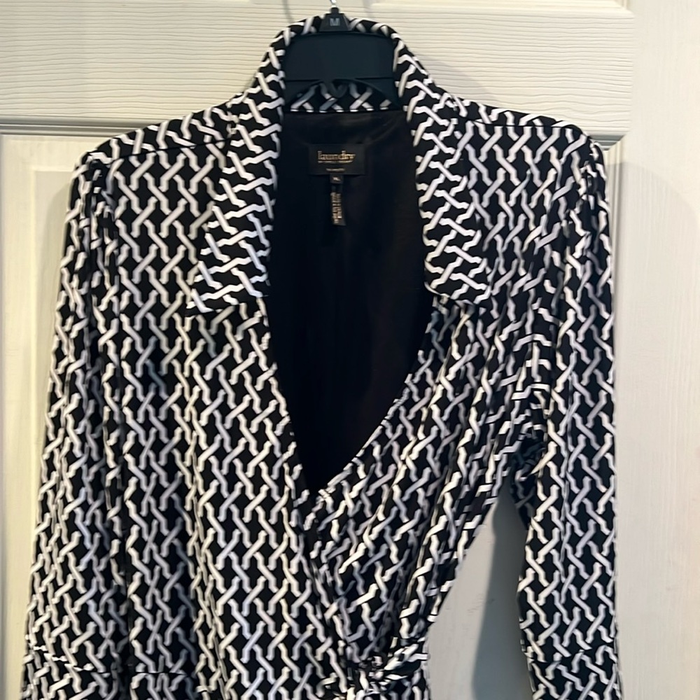 Wrap Dress  black and white print ties at the side. Below knee length